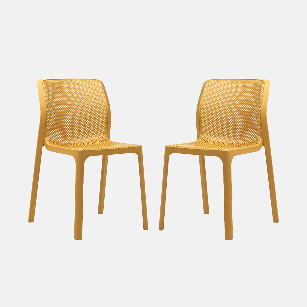 Two yellow chairs with a mesh backrest and seat design on a grey background