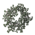 Artificial pine wreath on a white background
