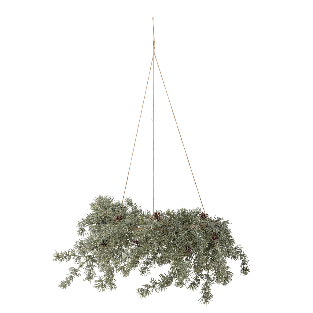 Hanging artificial Christmas garland with pine cones on a white background