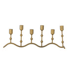 Gold candelabra with six candle holders on a white background