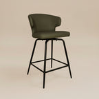 Green bar stool with black metal legs on a white background