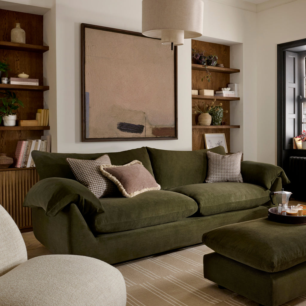 Bayswater collection Green sofa with decorative pillows in a living room setting.