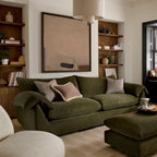 Bayswater collection Green sofa with decorative pillows in a living room setting.