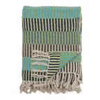 Woven blue blanket with striped pattern and fringes on a white background