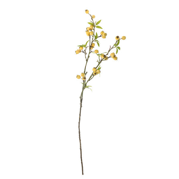 Artificial flower branch with yellow flowers on a white background