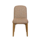 A modern dining chair with a textured, woven herringbone fabric upholstered seat and backrest, supported by four tapered natural wood legs, shown against a plain white background.