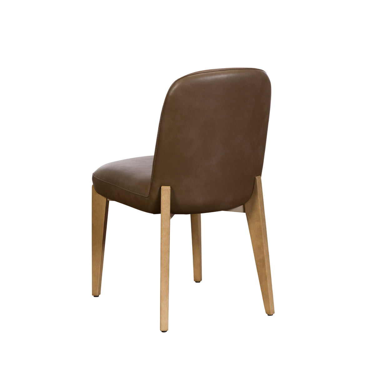 A dining chair with a brown faux-leather upholstered seat and backrest, supported by four tapered light natural wood legs, shown from a three-quarters angle on a white background.
