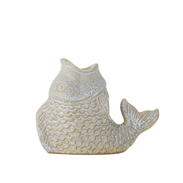 Ceramic fish candle holder designed for tealight candles.
