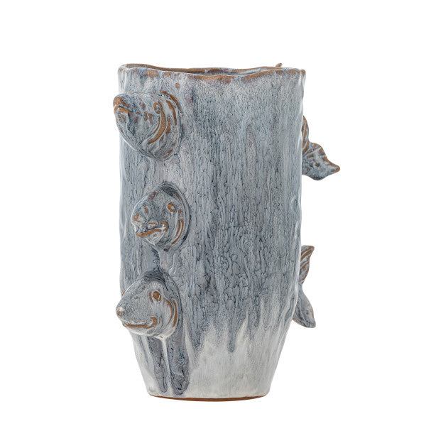 Artistic fish-shaped vase displayed on a shelf