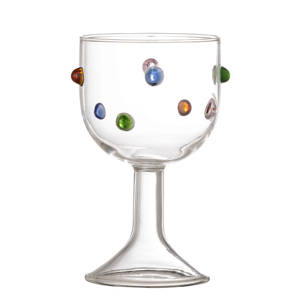 Dotty wine glass on a white background, clear all the way round