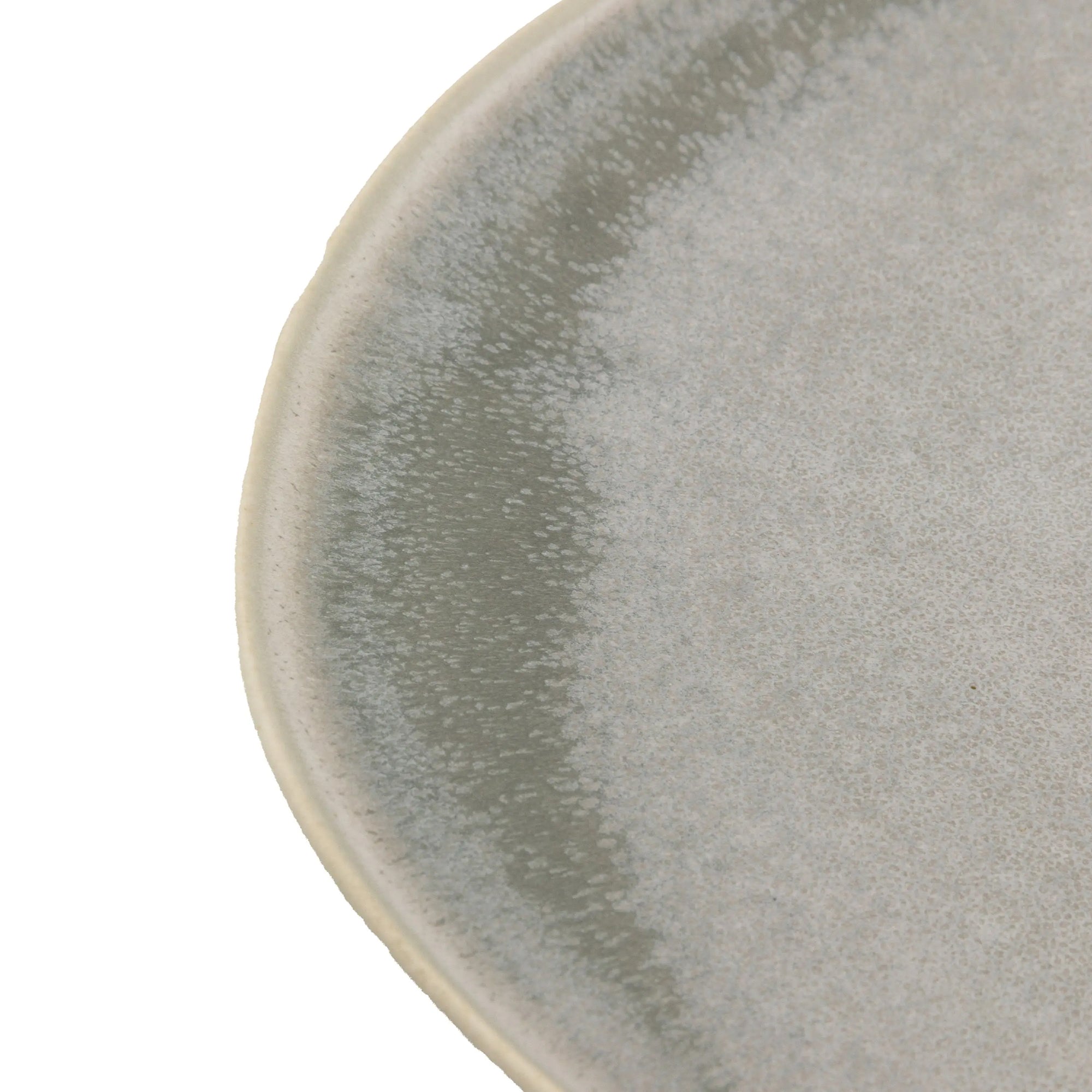 Close-up of dove grey glaze finish on ceramic dinner plate