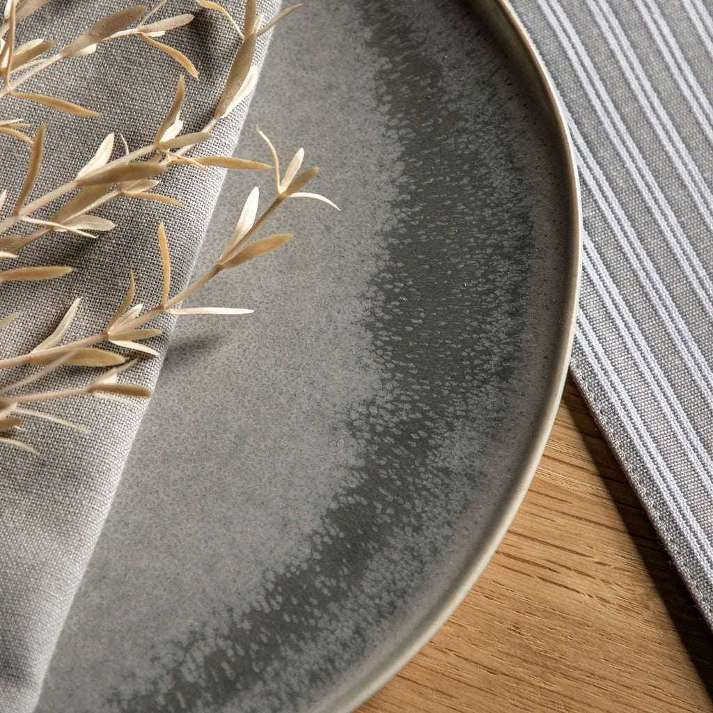 Add timeless style to your dining collection with a stone and dove grey ceramic side plate