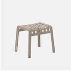 Corda Poggio stool with a lattice design on a white background