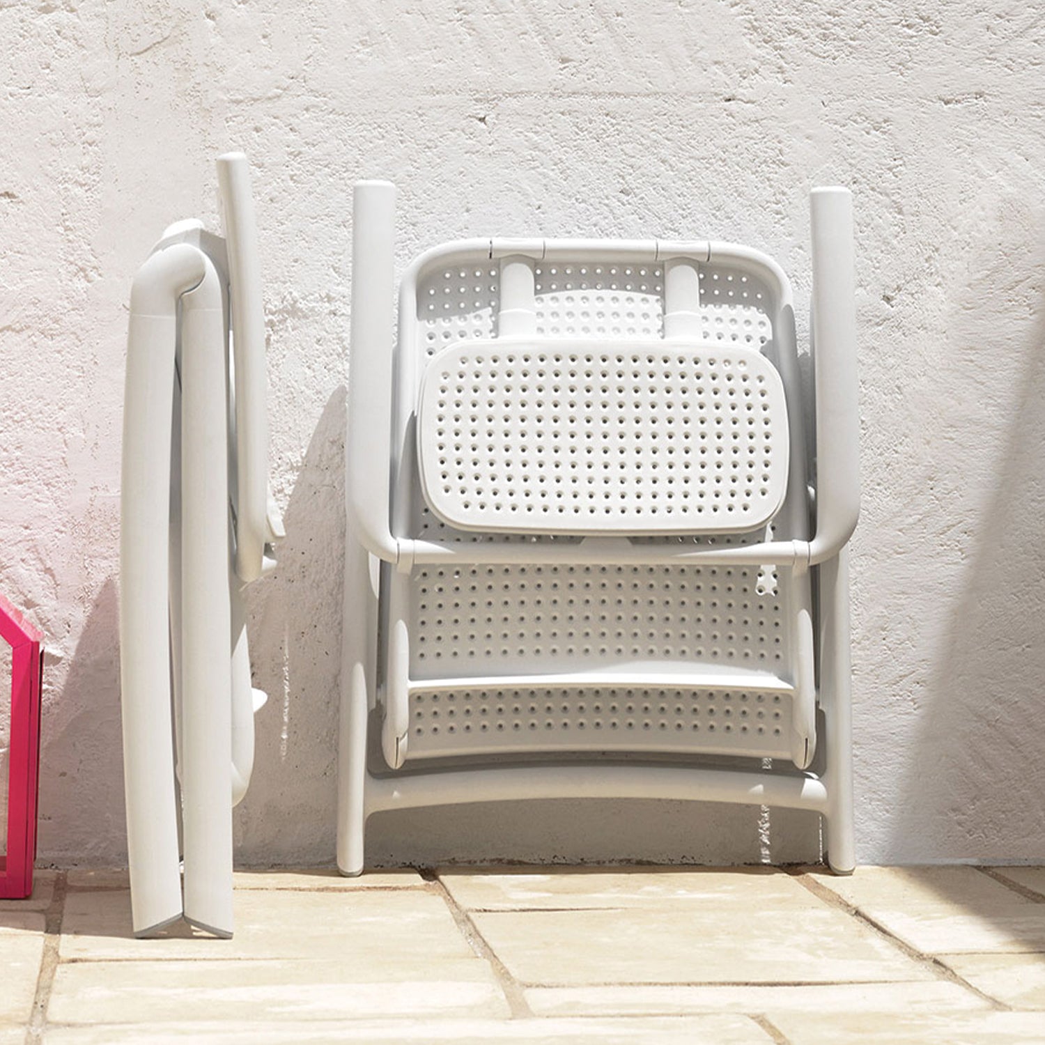 The Darsena Garden Chair, where ergonomic design meets chic Italian outdoor living.