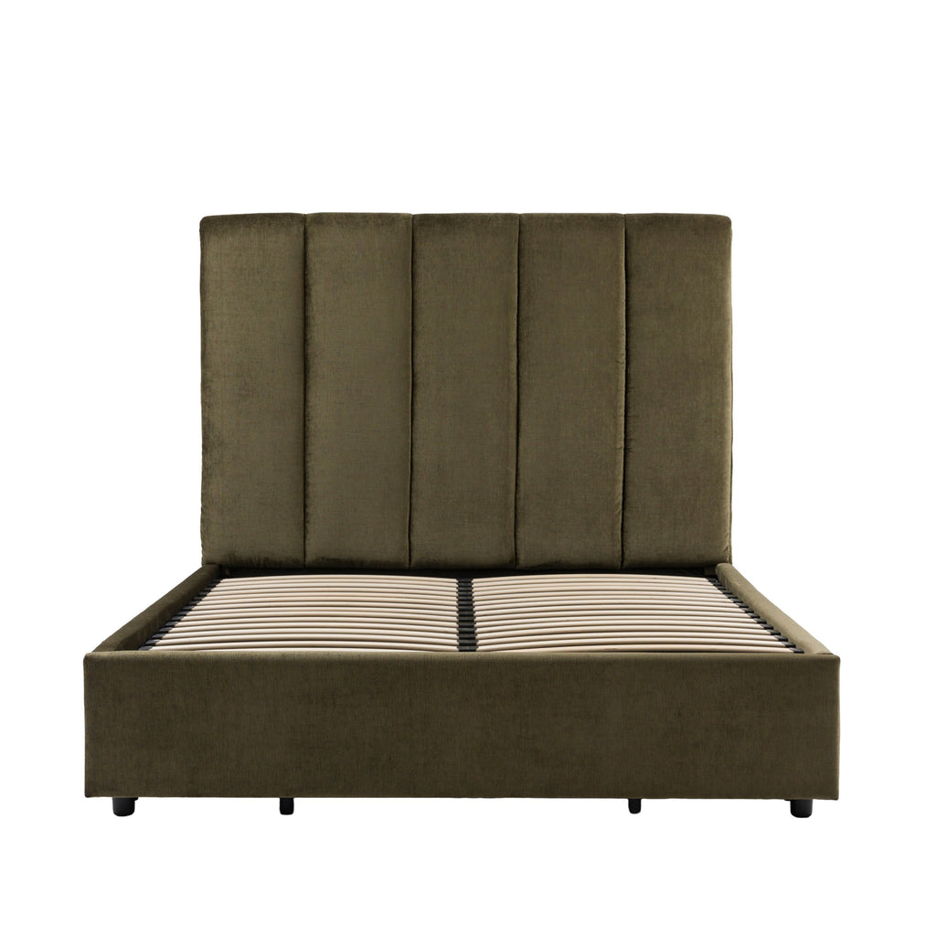 An upholstered bed frame with a tall, vertically channel-tufted headboard in an olive green fabric, supported by a slatted base, shown against a plain white background.