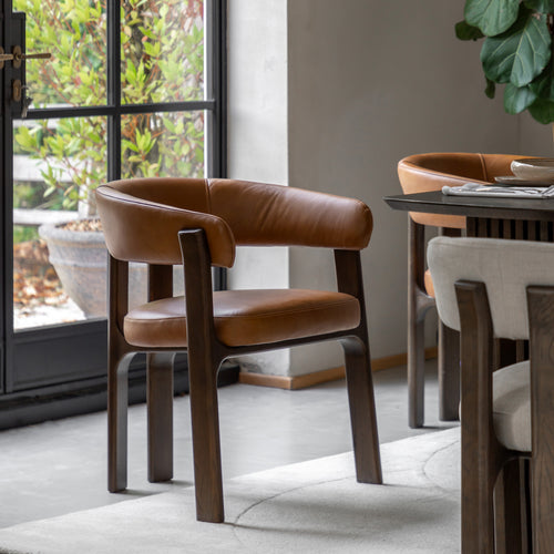Brown dining chair in modern dining room setting