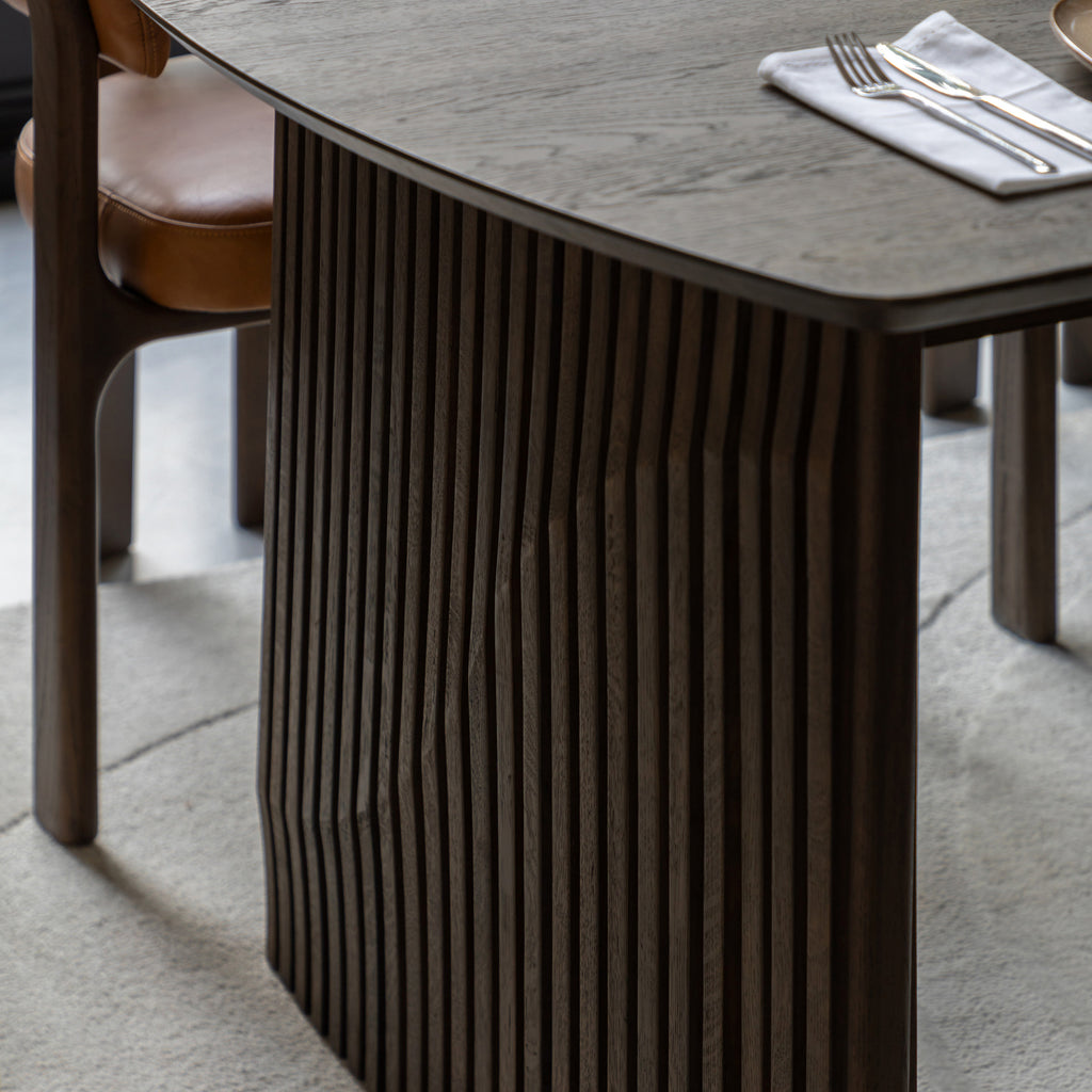Compact dining table extending to larger size