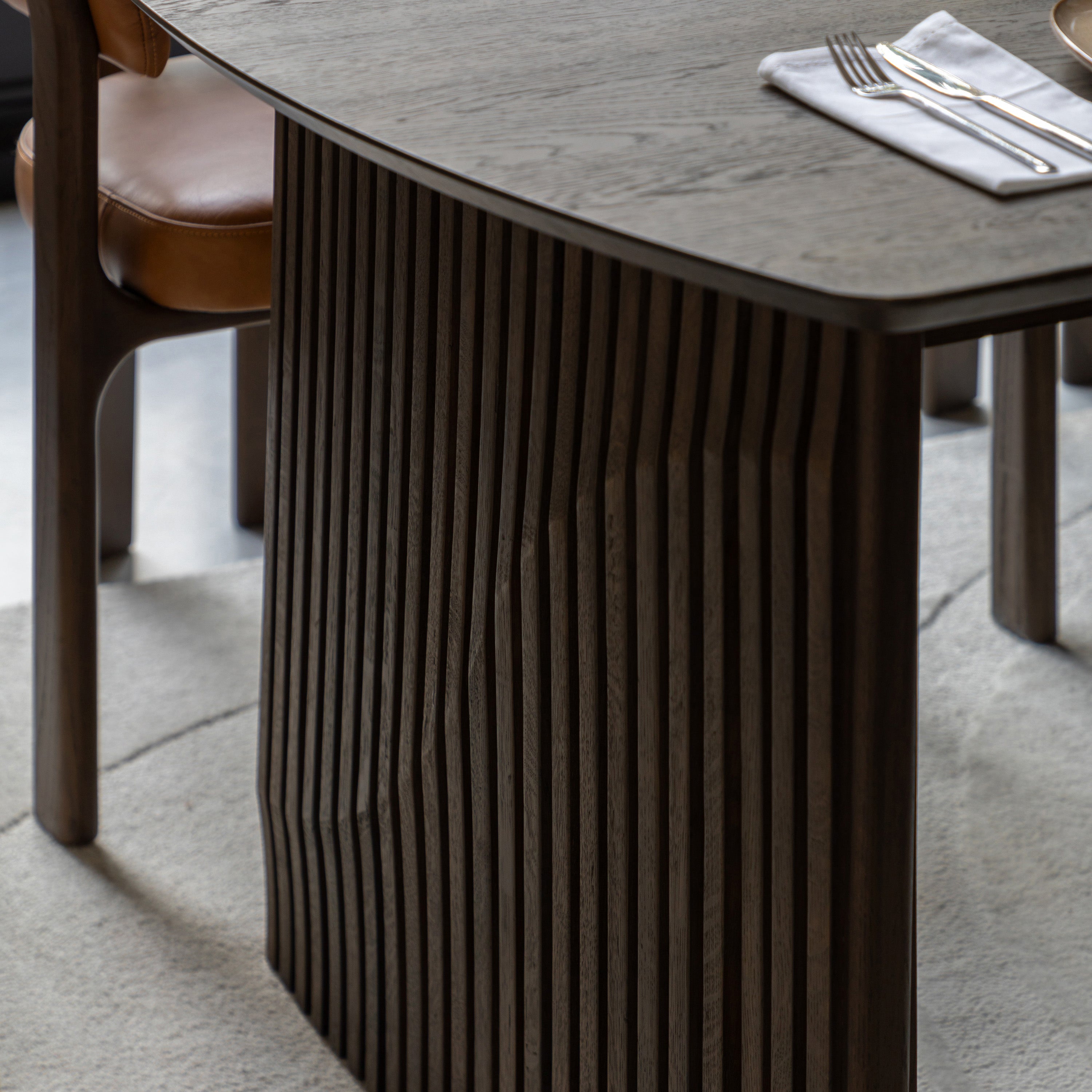 Compact dining table extending to larger size