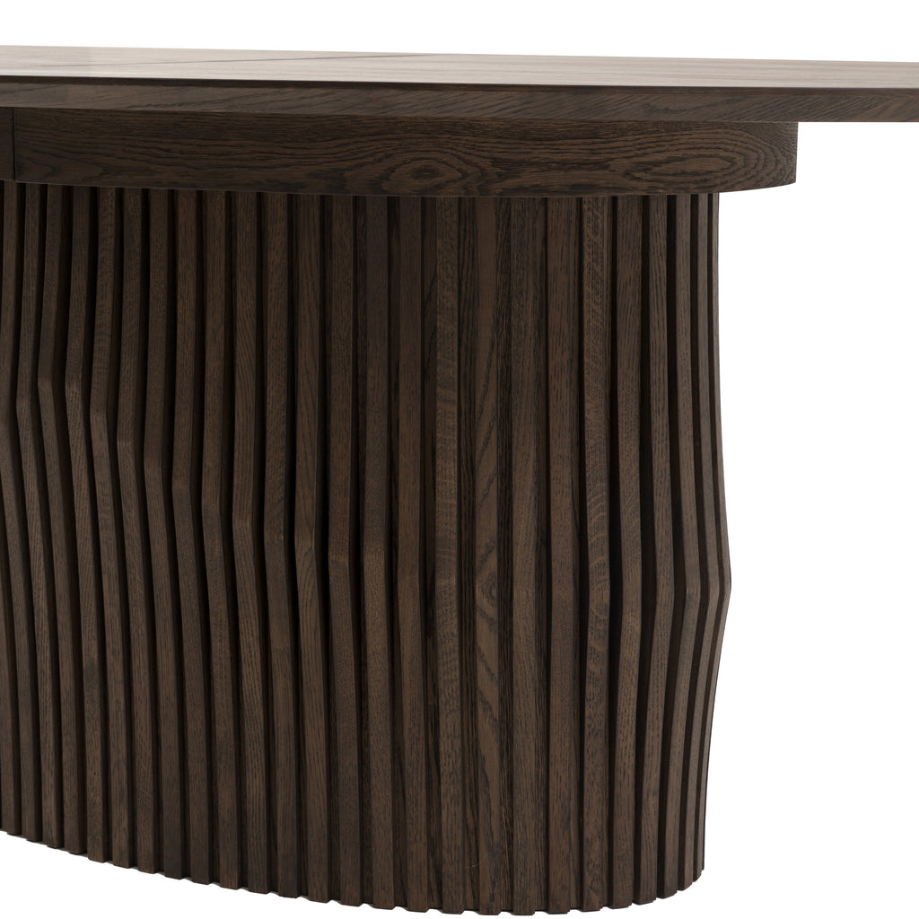 Stylish oval dining table with extension mechanism