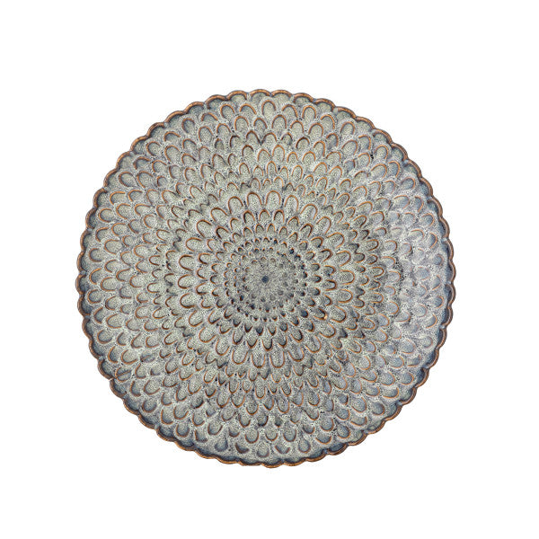 Grey dinner plates styled as a table centrepiece in a minimalist home