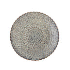 Grey dinner plates styled as a table centrepiece in a minimalist home