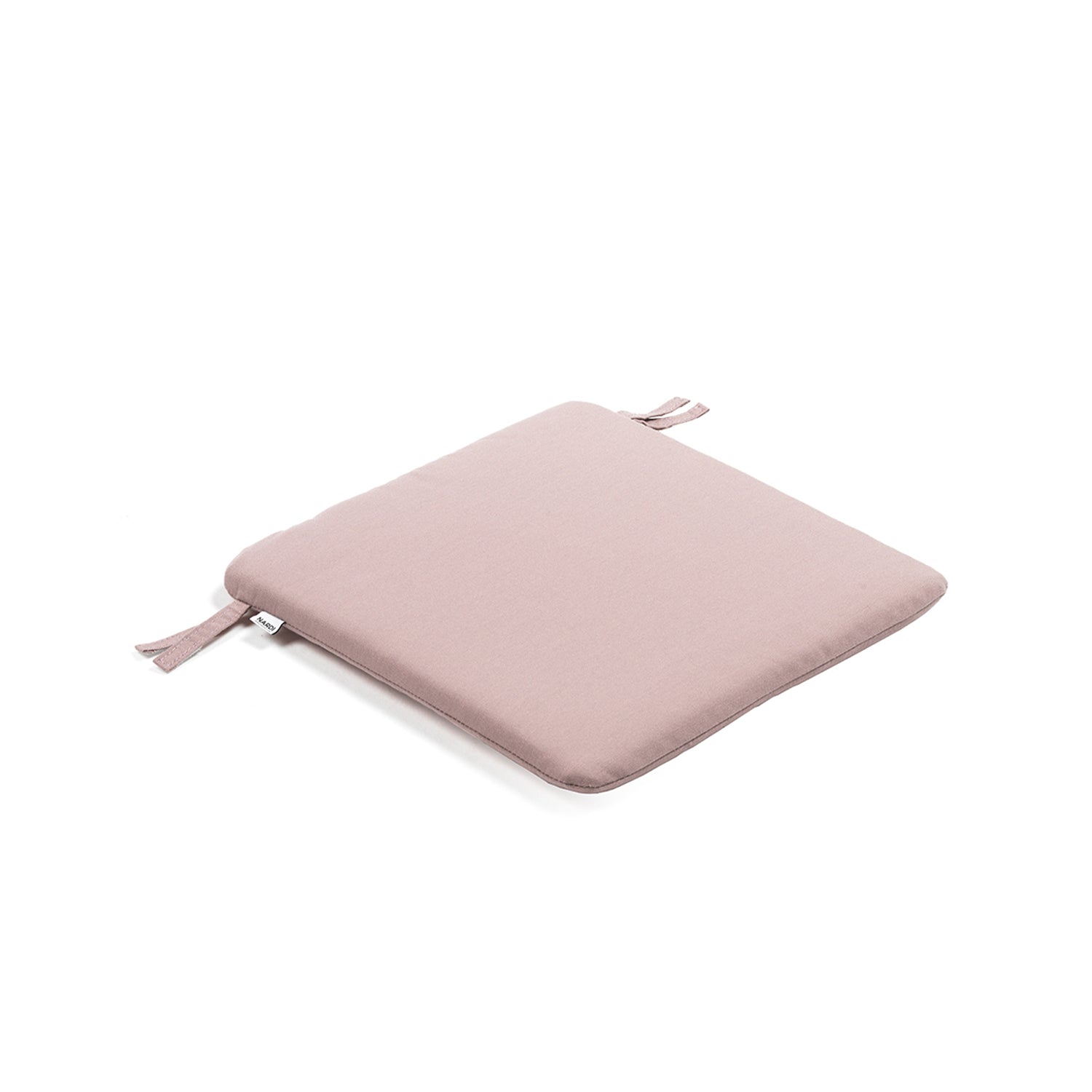 Doga Armchair Cushion adding comfort to a minimalist outdoor chair