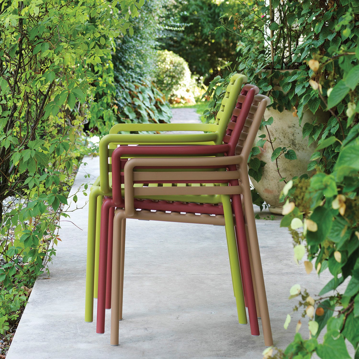 Elegant Doga Armchair enhancing outdoor furniture style.