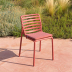 Doga Bistro Cushion in a vibrant outdoor seating area.