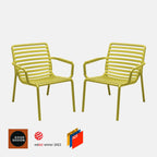 Two Doga pear green chairs on a white background with design award logos. 