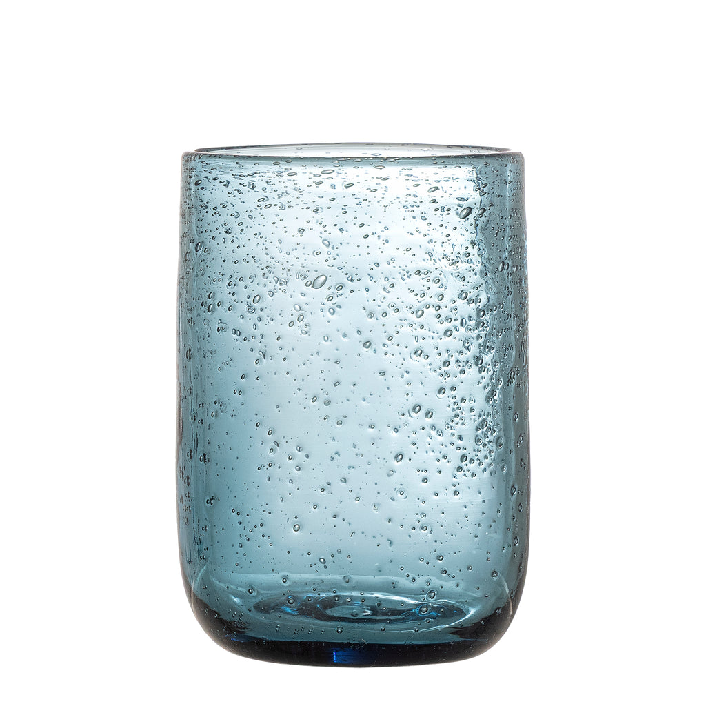 Minimalist blue tumbler glass used for everyday drinks