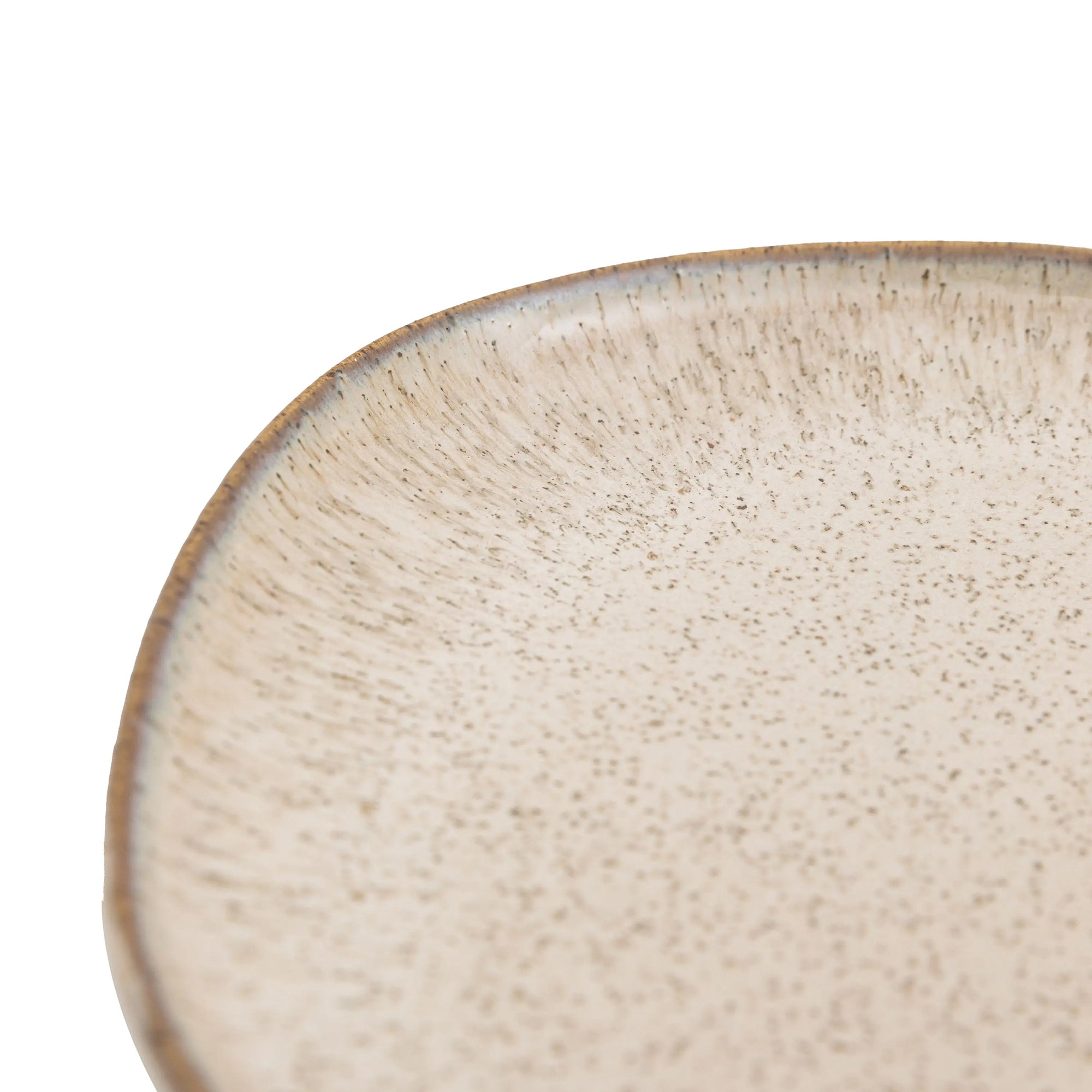 Minimalist white side plate styled with breakfast oats and fruit
