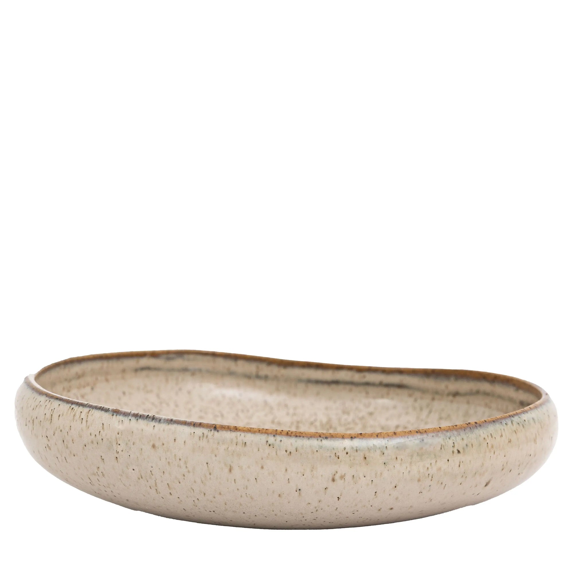 White oatmeal bowl styled in contemporary kitchen setting