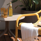 The Spritz garden table looks great here with the net lounge chair. The table can be made taller if required.