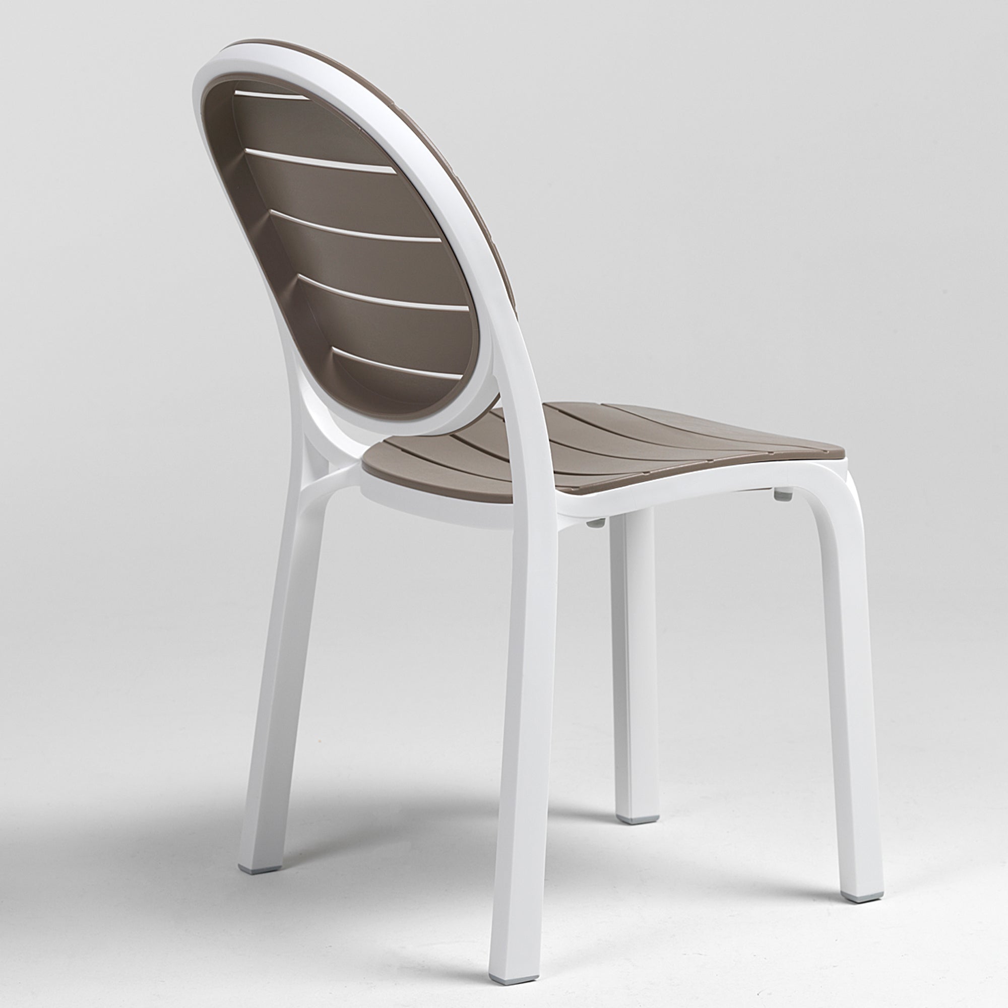 Rear view of the Erica chair with white frame and brown seat and backrest on a light background
