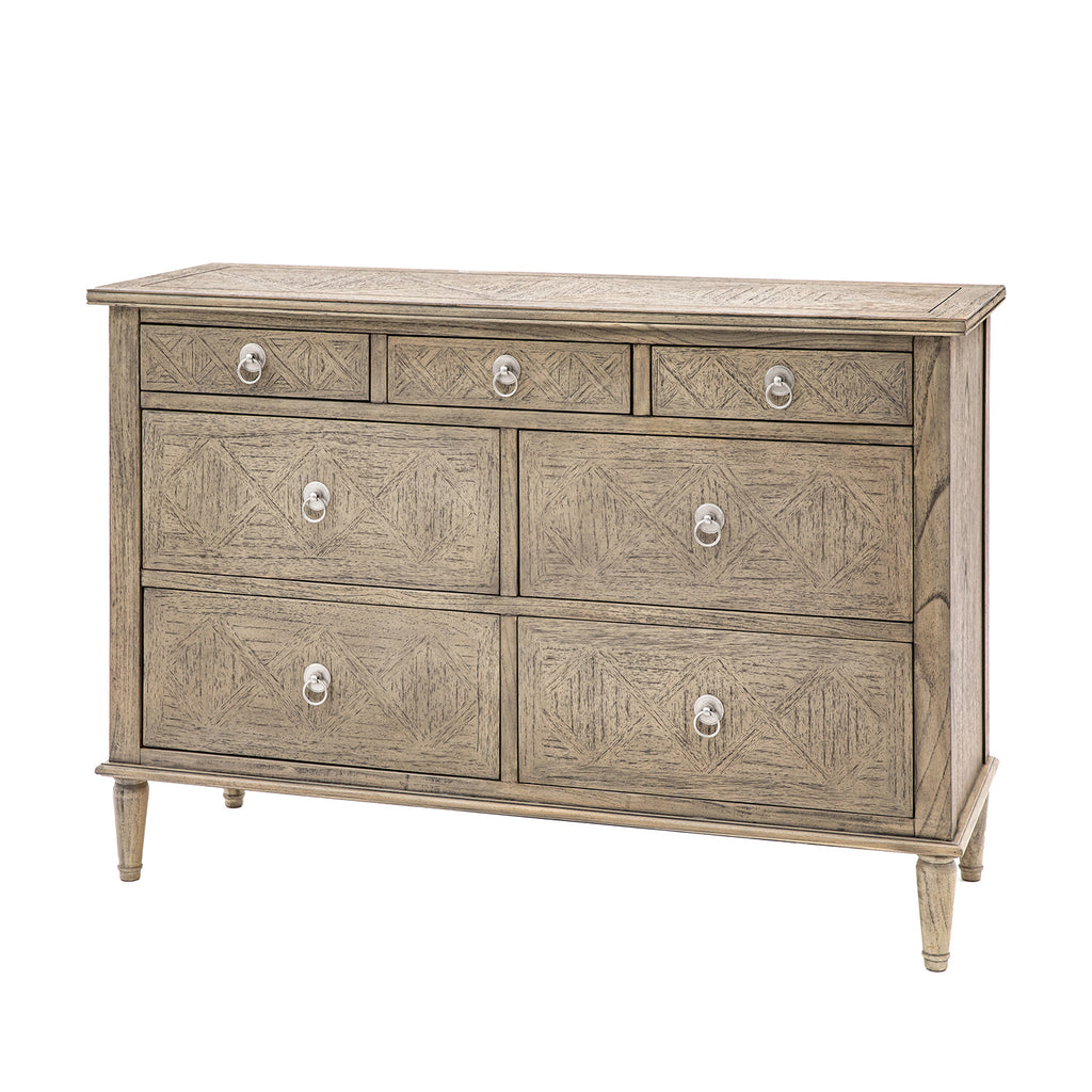 Faringdon 7 Drawer Chest with elegant parquet wood top design and turned feet, featuring three small drawers at the top and four larger drawers below