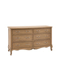 Wooden dresser with multiple drawers on a white background