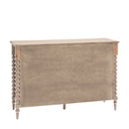 Wooden chest of drawers with spindle legs on a white background