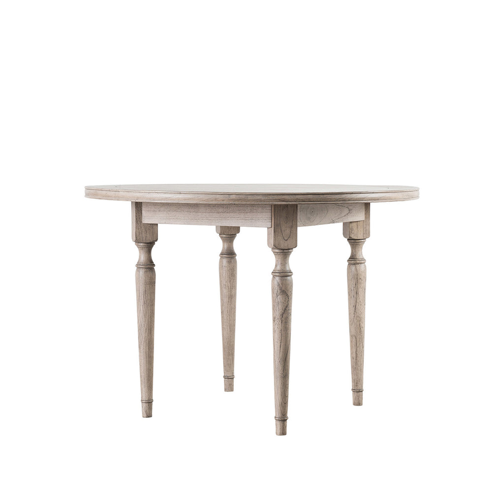 Side angle of Faringdon Round Dining Table displaying the ornate turned legs and solid construction, showcasing its craftsmanship and stability