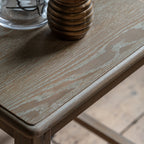 Overhead view of Wallingford Side Table's wooden top, revealing the natural grain patterns and smooth finish of the surface