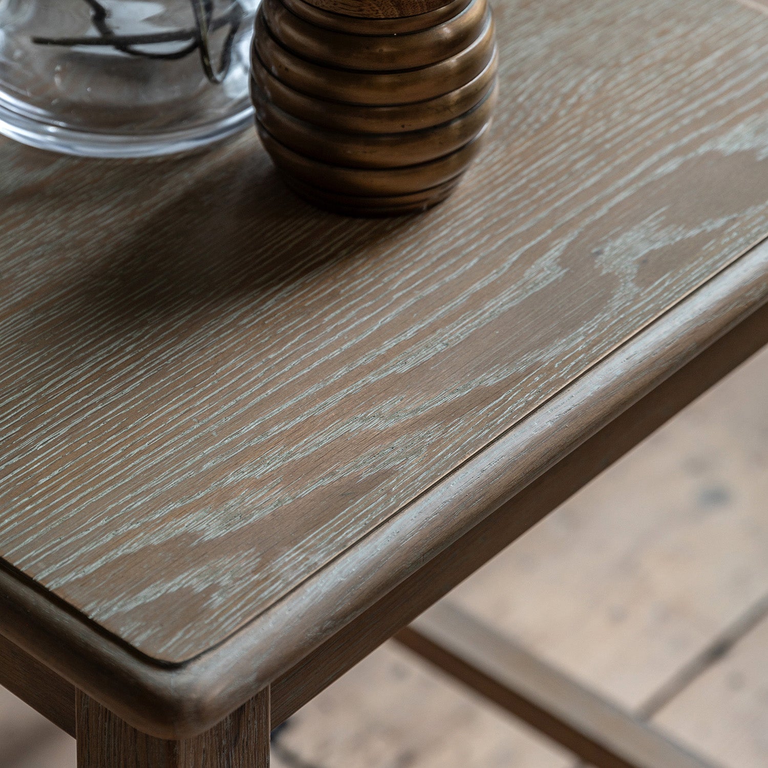 Overhead view of Wallingford Side Table's wooden top, revealing the natural grain patterns and smooth finish of the surface