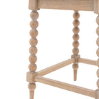 Close-up of Wallingford Side Table's leg design, showcasing the distinctive shape and structural elements that define its style