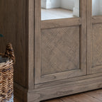 Close-up detail of Faringdon Wardrobe's parquet wood pattern and craftsmanship, highlighting the natural grain variations and quality construction.