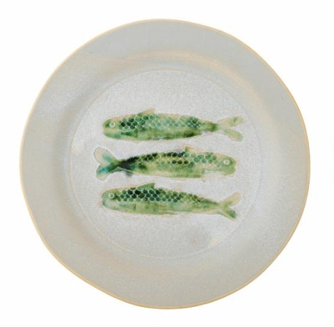 Round ceramic fish plate with green coastal design on white background