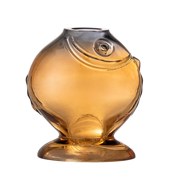 lose-up of yellow fish vase showing sculpted features