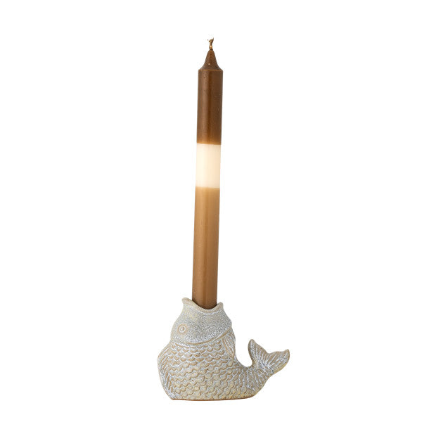 Fish-shaped candle holder with decorative scales and tealight candle.