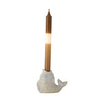 Fish-shaped candle holder with decorative scales and tealight candle.