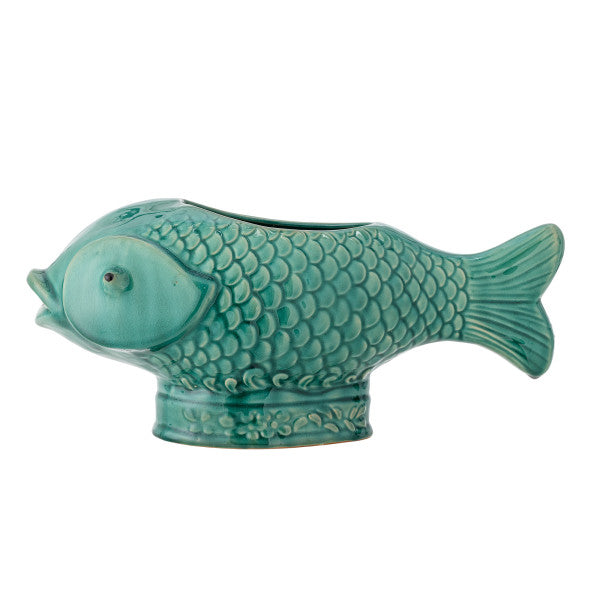 Green fish-shaped flowerpot with decorative scales for indoor plants.