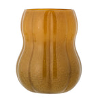 Decorative brown pumpkin vase used as a fall centrepiece