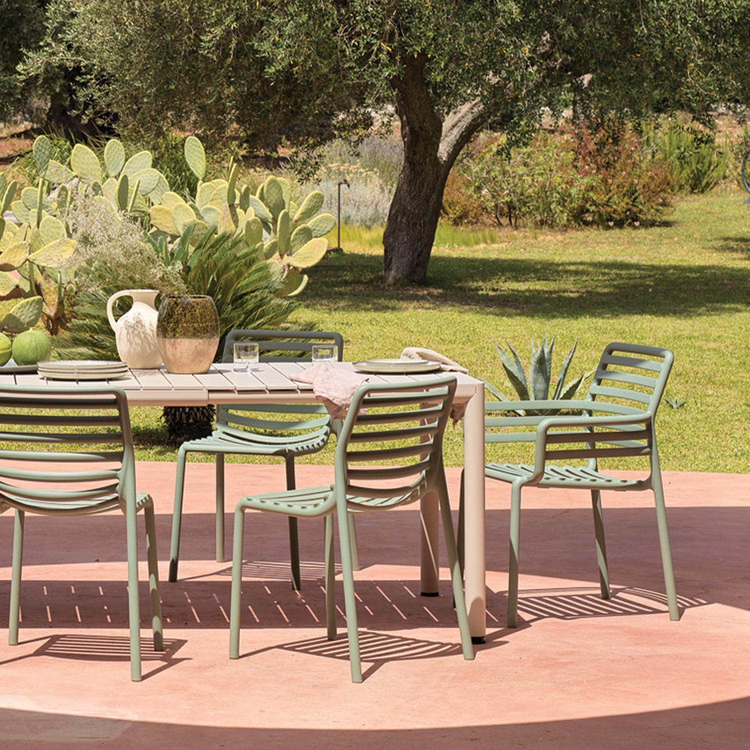 Doga Armchair enhancing a modern outdoor seating area