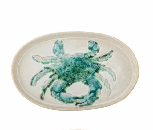 Green crab plate with a cream background, perfect for creating a dining table design